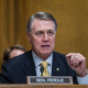 Illustration for article titled White on White Violence: Jon Ossoff Calls Sen. David Perdue a ‘Crook’ to His Face